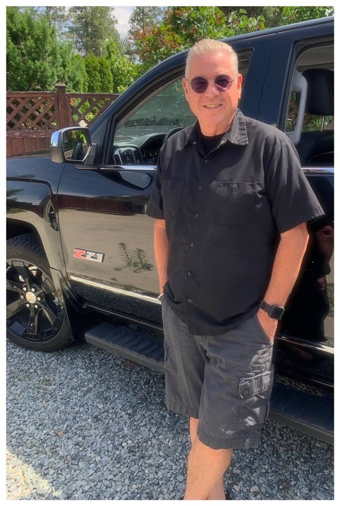 old man named Vin standing by his truck Kelowna home inspections
